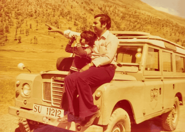 Dr. Kavin Mistry with his father as a child in Serengeti Plateau near the Hadza tribal area.